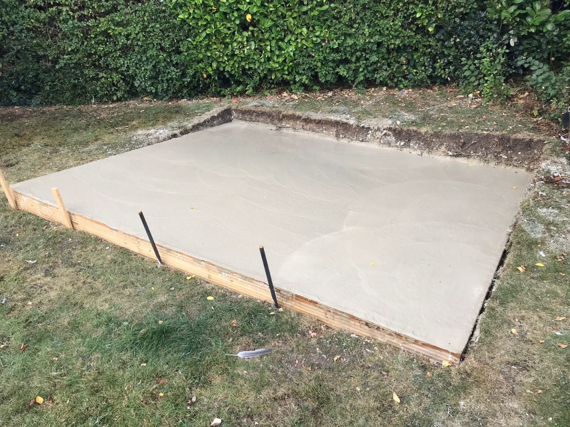 Large concrete base setting for base of shed