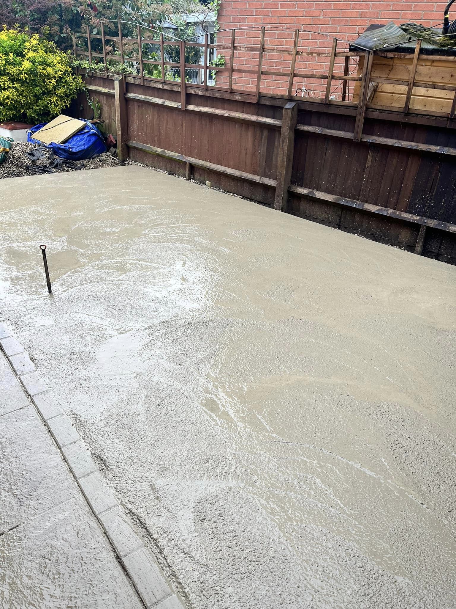 new laid concrete base in back garden